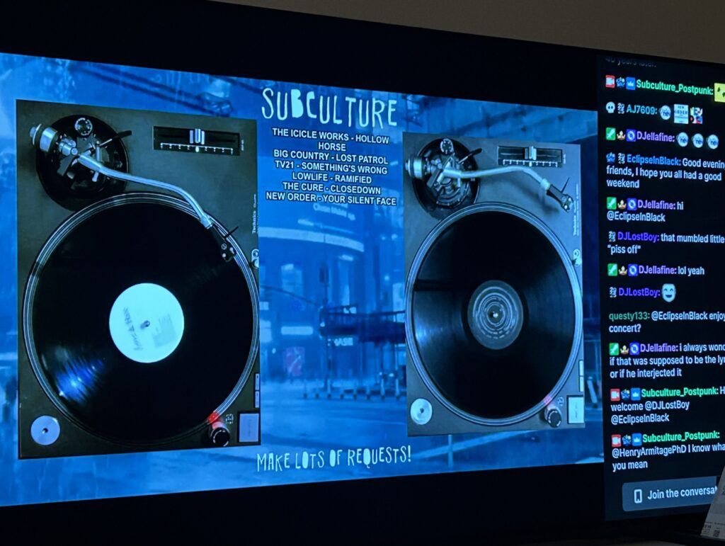 a TV with a streaming music show playing on it